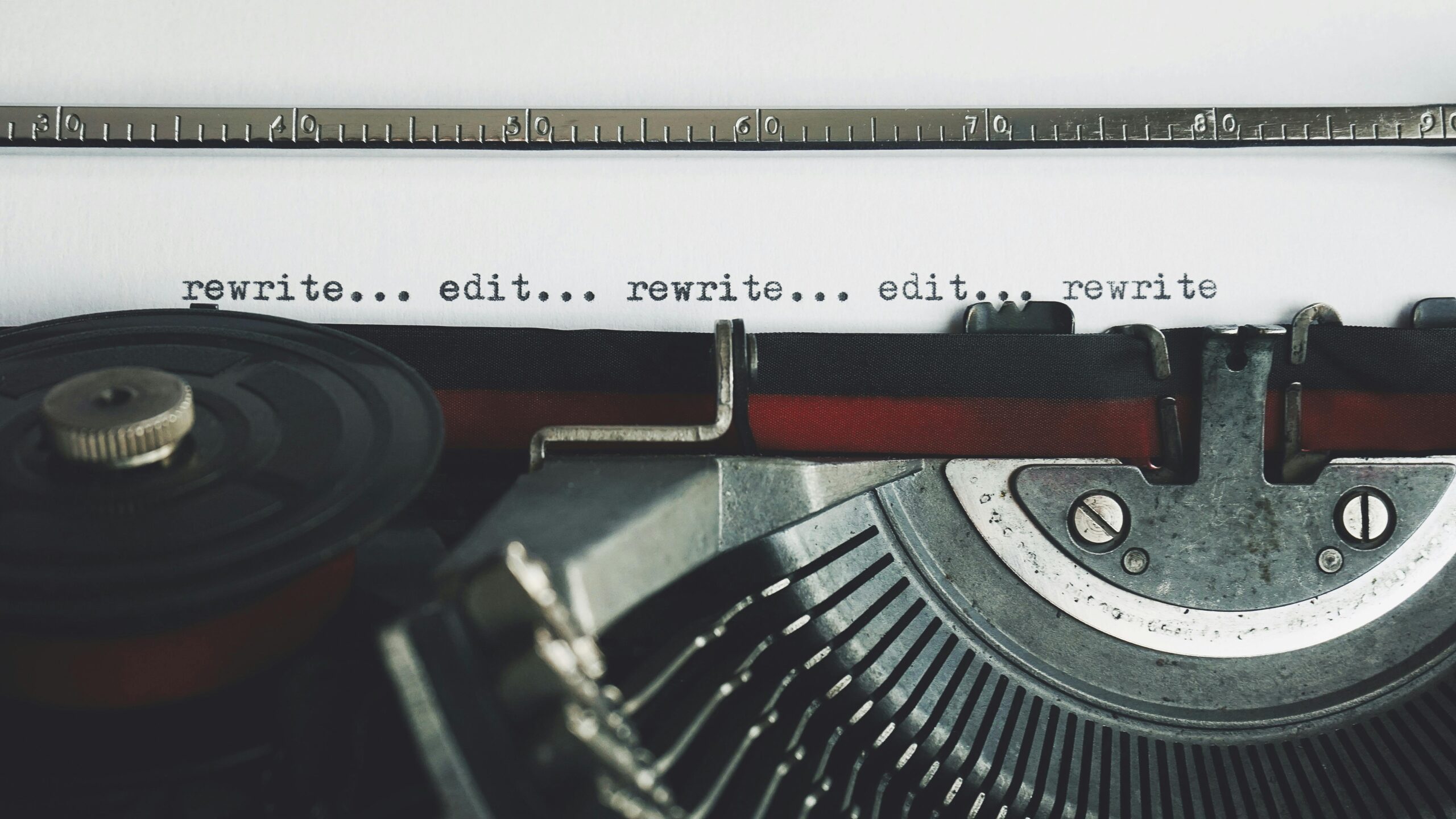 typewriter that says write edit rewrite edit